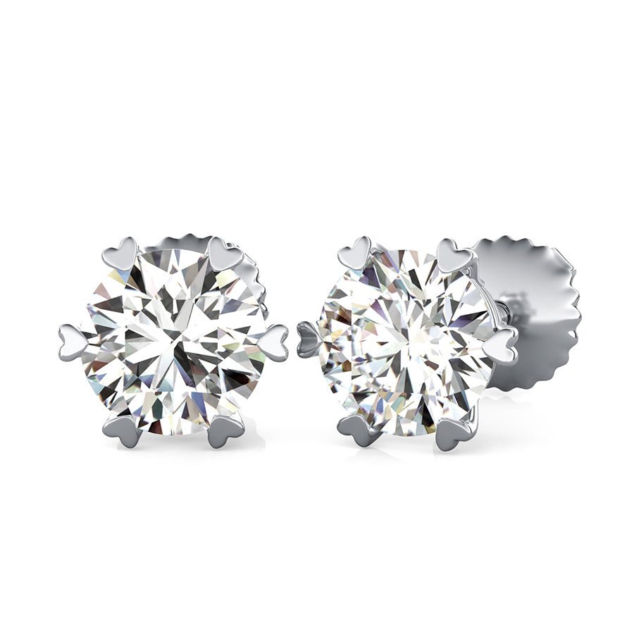 Solitaire Stud Earrings With Heart Shaped Prong - Jewelry Exchange Center